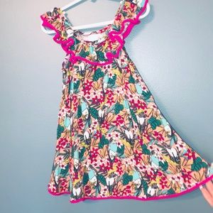 Fun, comfy, toss it on dress. Doesn’t wrinkle